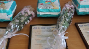 Сертификаты на материнский (семейный) капитал, подарки для детей и цветы для мам